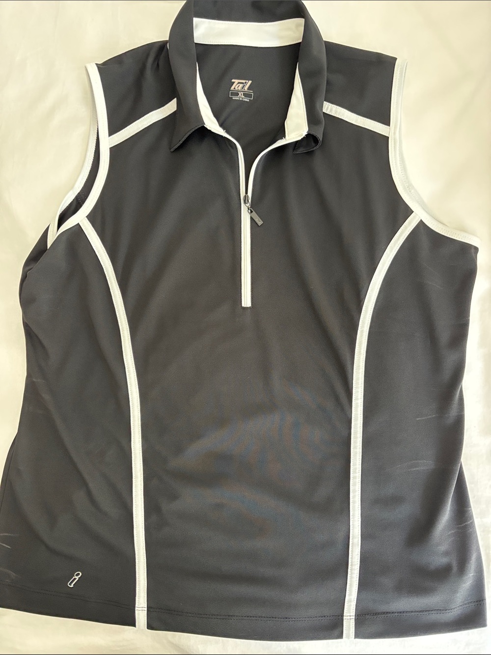 Tail Women’s  Black and White Golf Shirt.